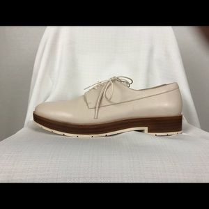 Pour La Victoire cream leather Oxfords.